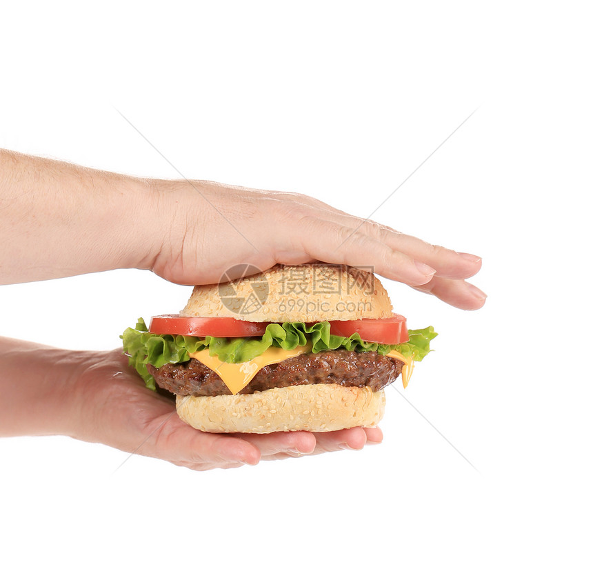 手握着美味的汉堡包图片