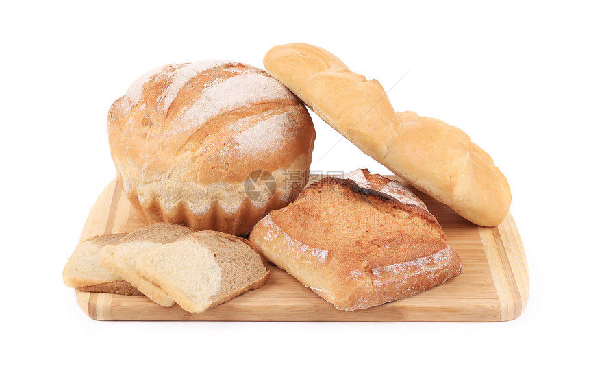 切头板上的各种面包传统农业产品亚麻砧板面粉早餐消费者木头种子图片