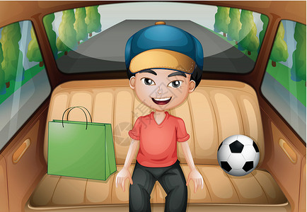 坐着抱球男孩一个男孩坐在一辆跑车里设计图片