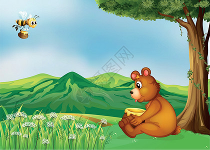 一只熊坐在树旁高清图片