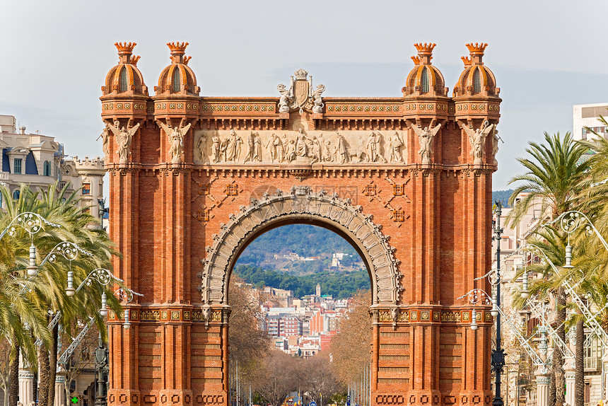 西班牙巴塞罗纳的胜利拱门日光石刻石头旅游目的地地方场景城市红砖图片