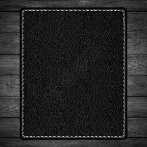 黑色皮黑背景徽章皮革床单空白粮食桌子木板接缝白色灰色背景图片