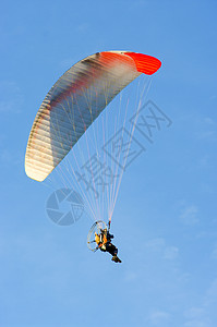 滑行滑动降落伞运动翅膀头盔爱好天空空气蓝色引擎飞行员背景图片