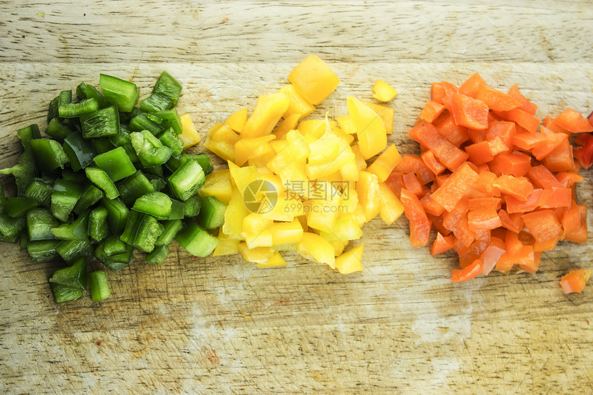 色彩多彩的甜甜胡椒片饮食美食食物橙子营养香料蔬菜胡椒保健卫生图片