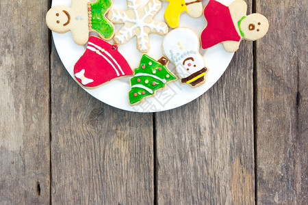 姜饼饼干蓝色雪花水平芳香食物饼干装饰木头棕色团体背景图片