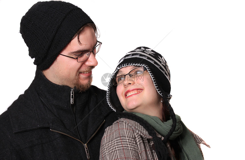 冬天穿戴可爱的年轻夫妇女士帽子白色男朋友夫妻朋友们大衣男生羊毛衣服图片