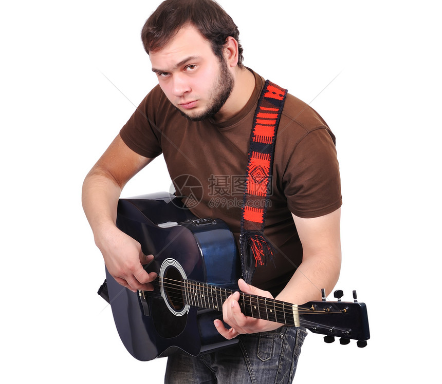 男人音乐家弹他的吉他图片