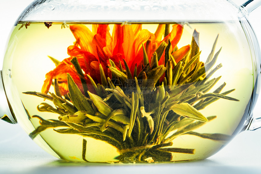 清茶壶中的茶花茶壶情调异国叶子仪式工作室花瓣酿造服务玻璃图片