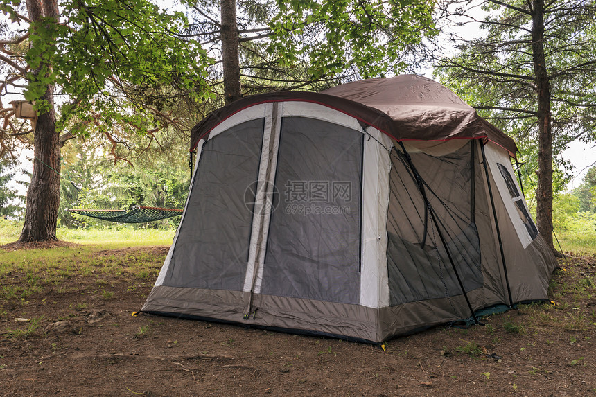 铺设帐篷加工旅行季节庇护所田园旅游日落光效风光游客图片