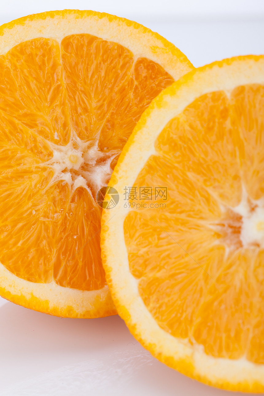 新鲜的橙色半分 以显示纸浆片段水果营养橙子收成饮食热带农业食物皮肤图片