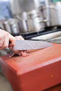 厨师或屠夫切肉刀刃红肉食物用具餐饮业屠宰场饮食厨具餐厅酒店背景图片