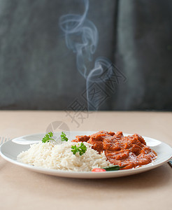 热拉提热咖喱香料盘子面包晚餐食物午餐美食蒸汽背景