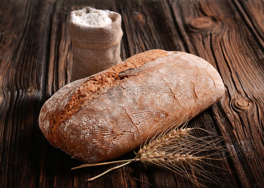 面包饼早餐面包师饮食谷物种子小麦脆皮包子面粉面包图片
