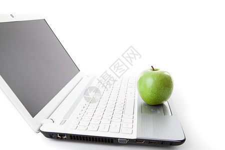 笔记本电脑键盘上的绿苹果喘息工作绿色购物水果静物桌子白色办公室桌面背景图片