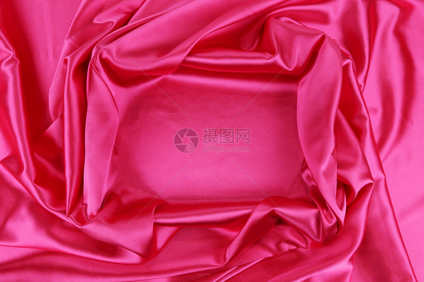 粉色丝绸背景材料海浪涟漪热情纺织品窗帘褶皱投标布料奢华图片