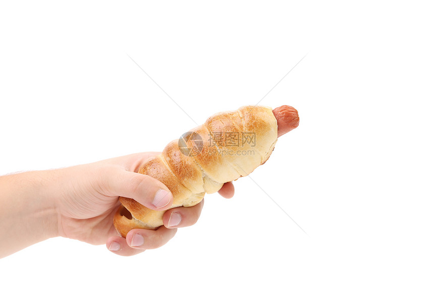 手握着烤热狗糊状包子烹饪文化香肠面包牛肉食物饮食午餐图片