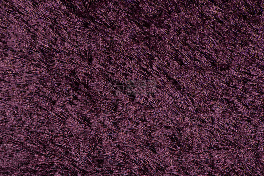紫地毯宏观紫色纺织品小地毯地面地板羊毛材料织物图片