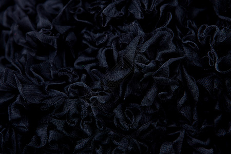 黑色图纸背景织物纹理材料荷叶褶皱背景图片