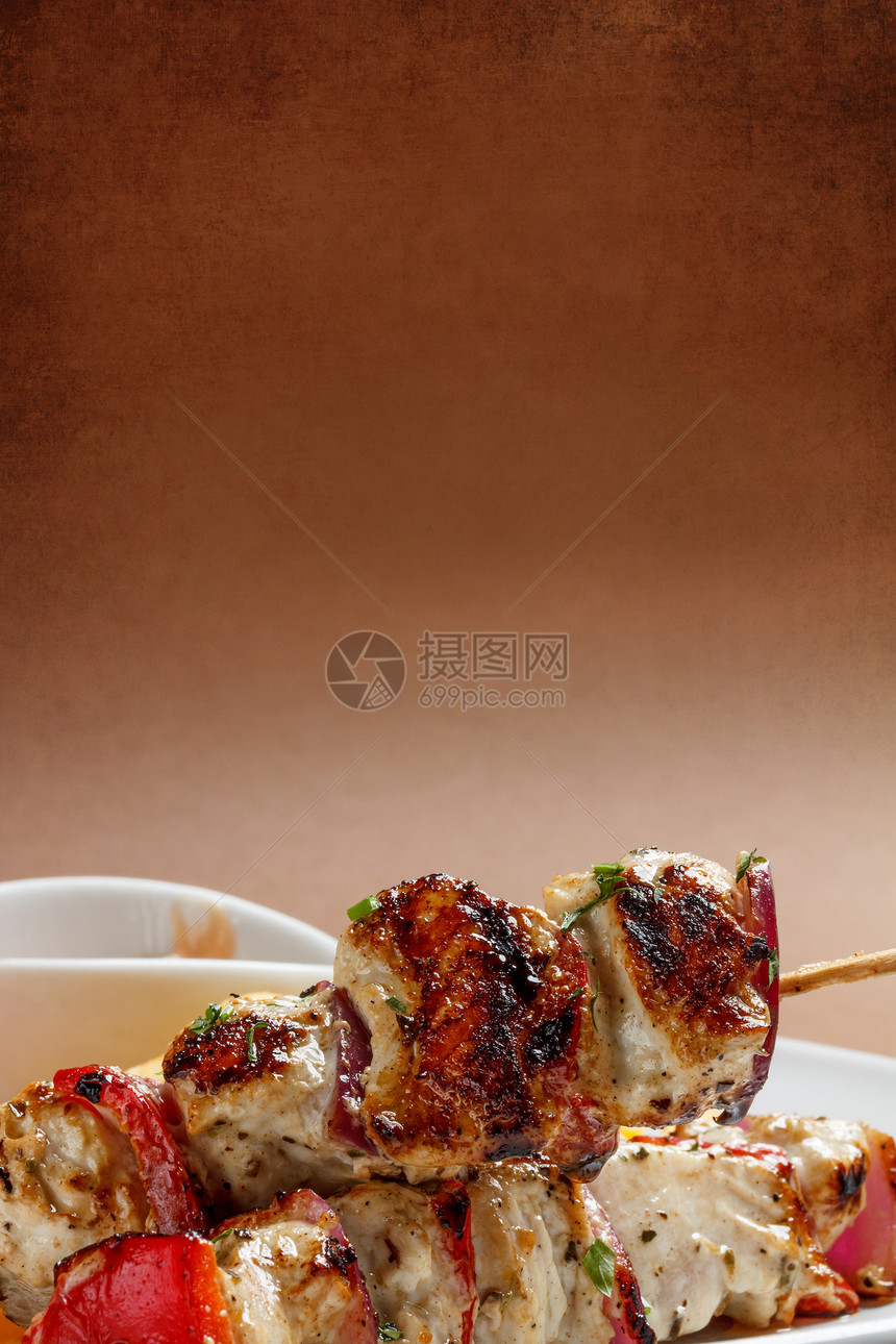 Shish 烤肉串蔬菜美食背景食物炙烤盘子棕色花环羊肉烹饪图片