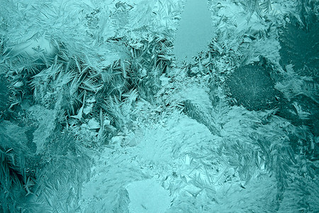 窗口上的霜冻玻璃背景图片