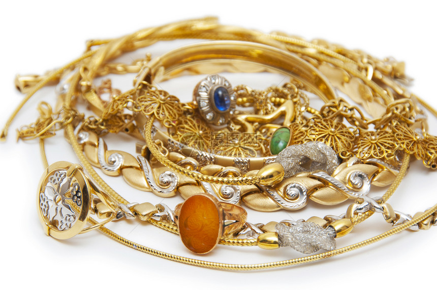 大量金首饰的收藏女性化宏观金属宝石女性礼物珠子石头钻石戒指图片