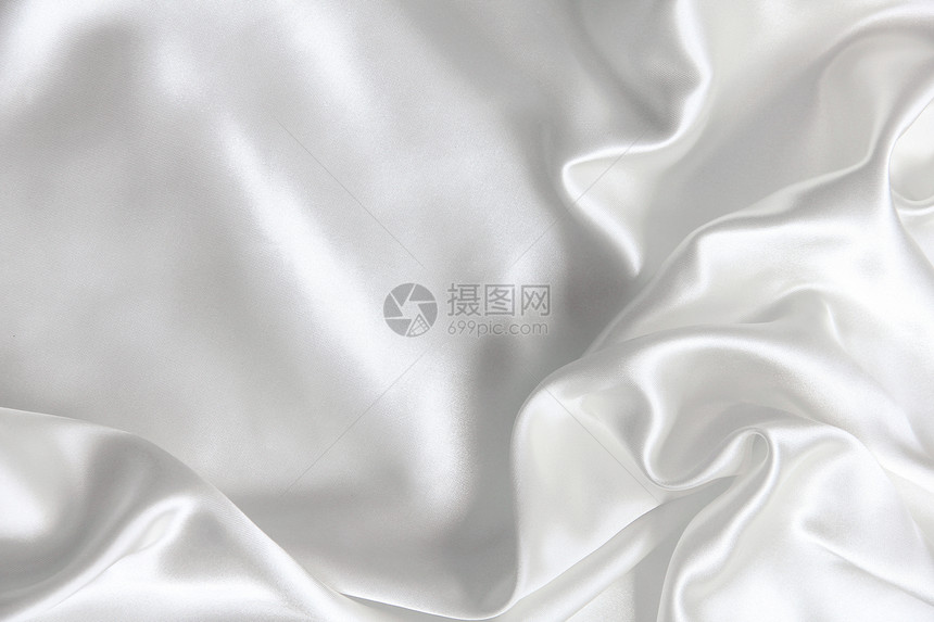 作为婚礼背景的平滑优雅白色丝绸涟漪海浪新娘投标曲线材料布料织物纺织品折痕图片
