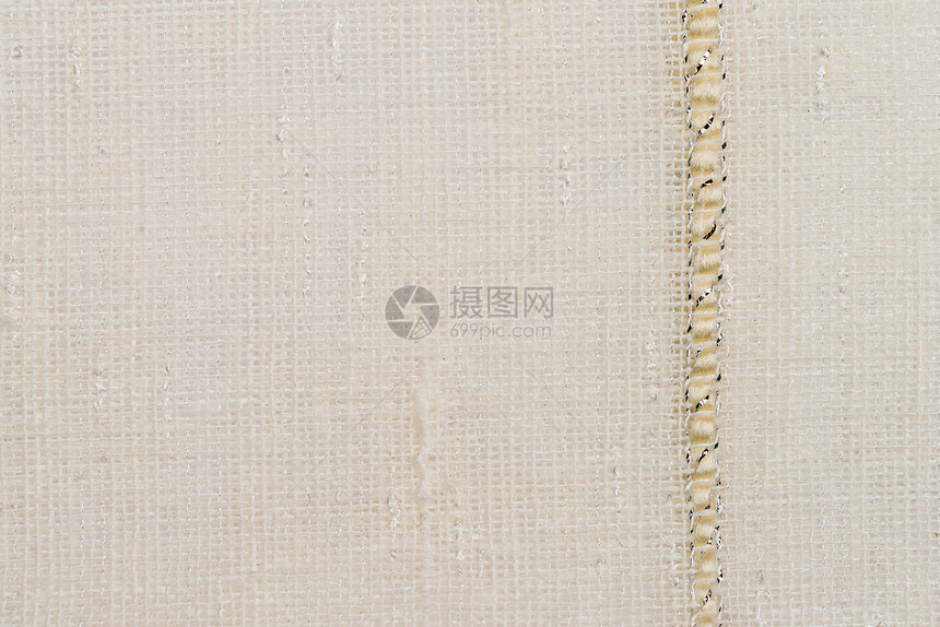Beige 结构纹理宏观帆布床单黄麻纤维状亚麻纤维针织抹布纺织品图片