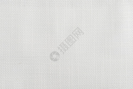 白色结构纹理床单亚麻纺织品针织帆布编织抹布宏观纤维状解雇背景图片
