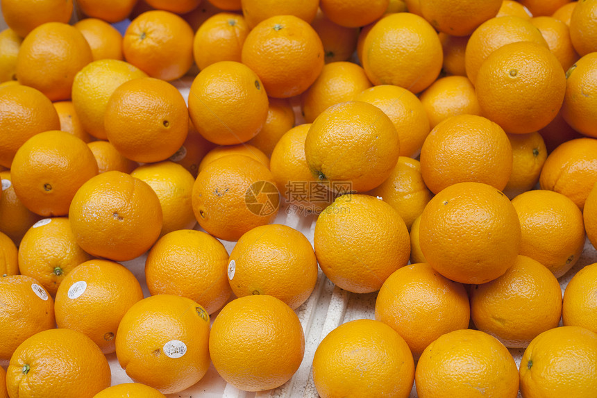 一大堆多汁熟熟的橙子图片
