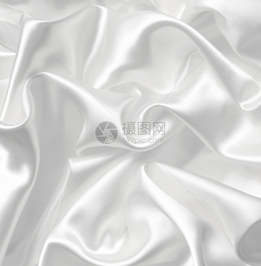 作为婚礼背景的平滑优雅白色丝绸折痕纺织品涟漪布料织物材料海浪银色新娘曲线图片