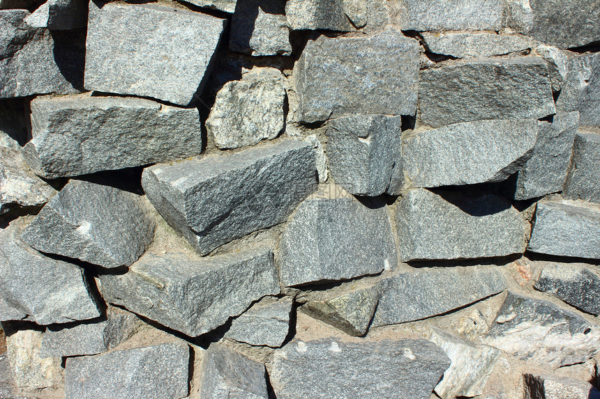 由石头制成的墙壁石方灰色岩石建筑学黏土建筑碎石石墙材料积木图片