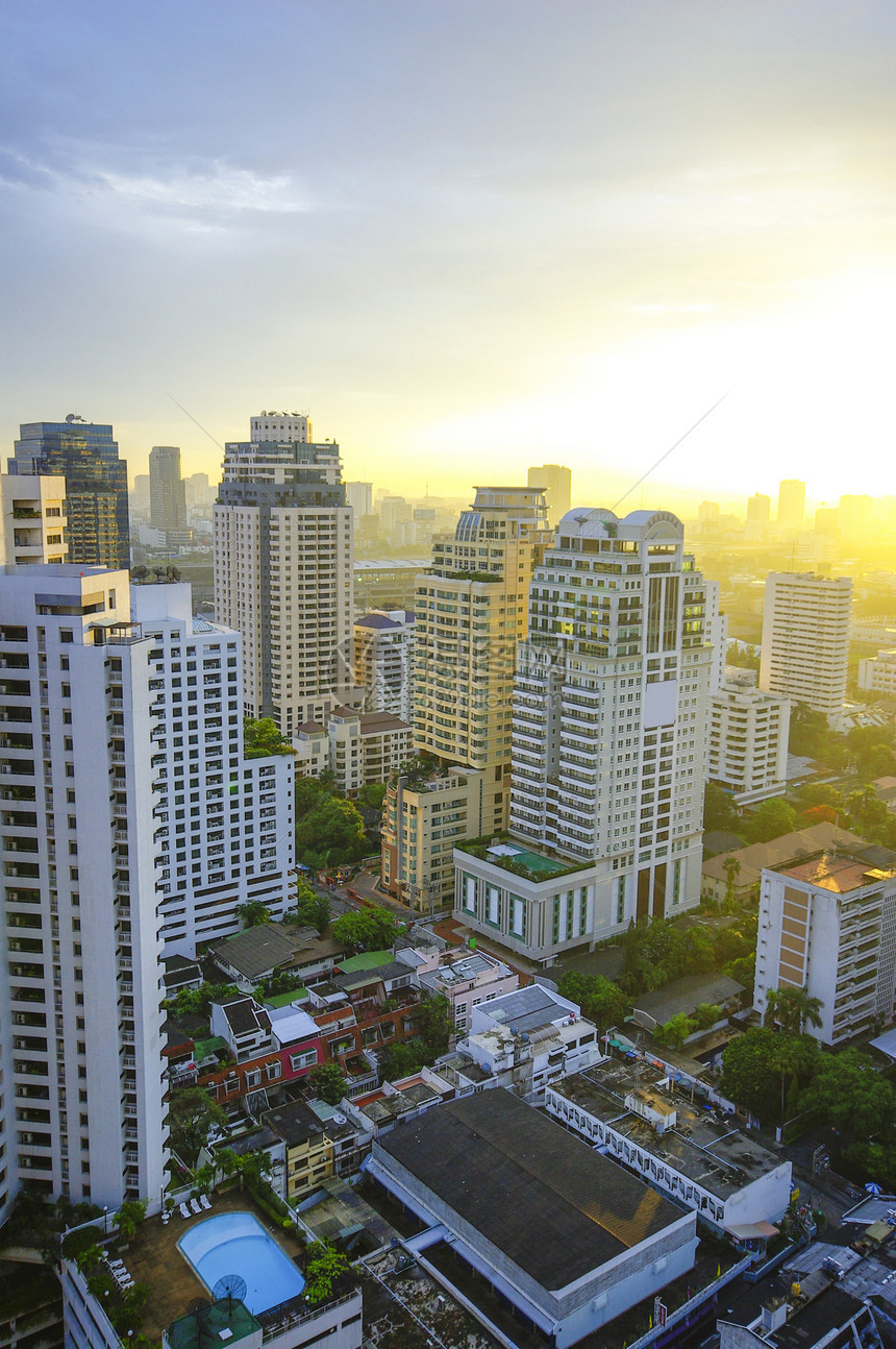 曼谷市上午旅行街道摩天大楼场景建筑物天空全景建筑学橙子日落图片