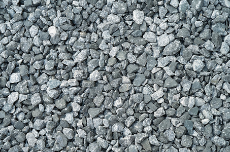压缩灰色砾石岩石粒子侵蚀粒状建造粮食碎石颗粒状地面宏观背景图片