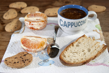 意式早餐饮食饼干咖啡面包早餐短号甜点果汁橙子水果背景图片