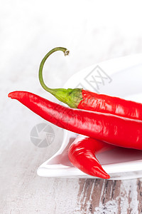 红辣椒烹饪蔬菜摄影美食香料食物白色胡椒红色背景图片