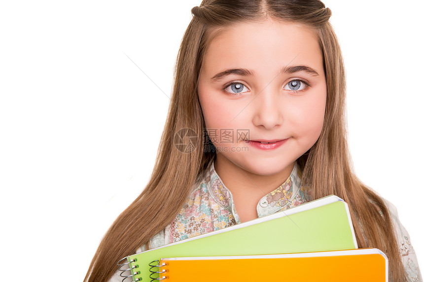 小学生持有笔记本幸福学校童年教育青少年微笑女学生白色青年孩子图片