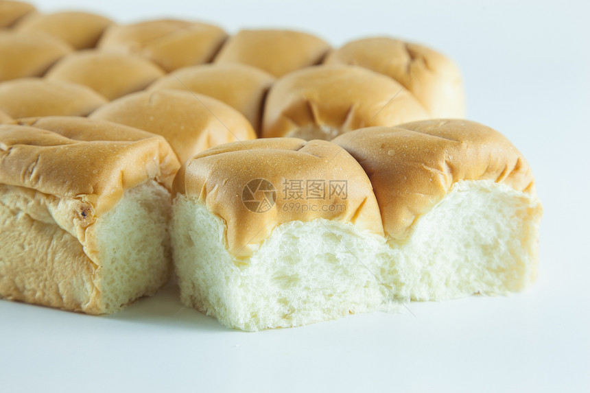 白色背景上的面包饮食早餐工作室面粉美食种子食物碳水面包师粮食图片