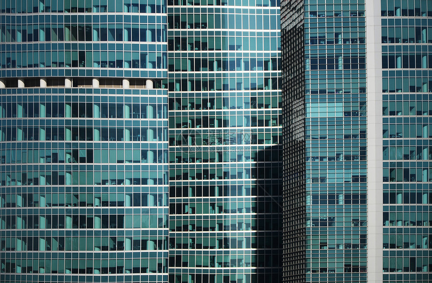 现代办公大楼玻璃窗外面详细细节工业金融摩天大楼窗户蓝色反射商业正方形玻璃城市图片