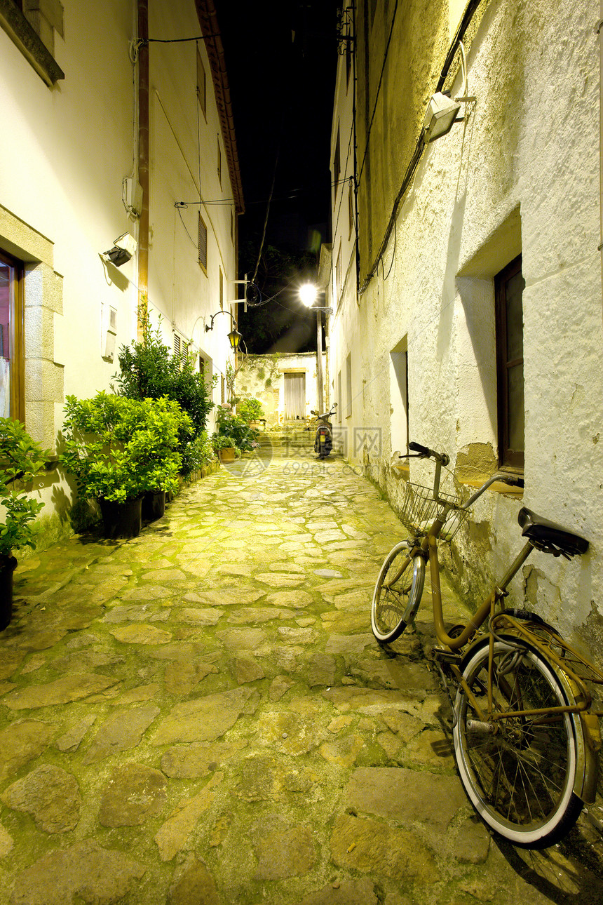 旧西班牙街怀旧旅游陶器照片墙壁旅行自行车石头房屋情调图片