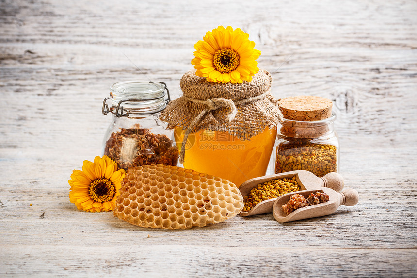 亲爱的食物团体养蜂业液体蜂蜜产品梳子花粉金子黄色图片