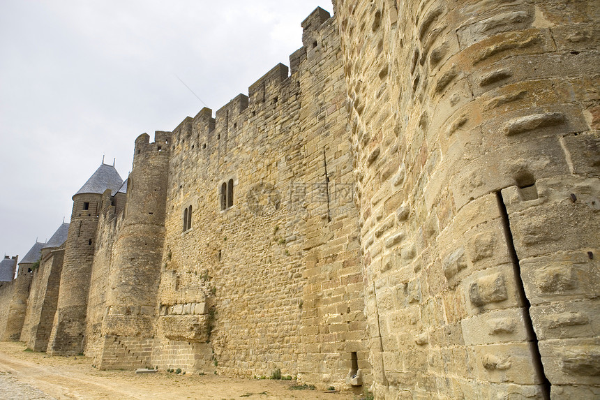 卡尔卡松防御墙壁石头城市爬坡天空旅游旅行蓝色建筑图片