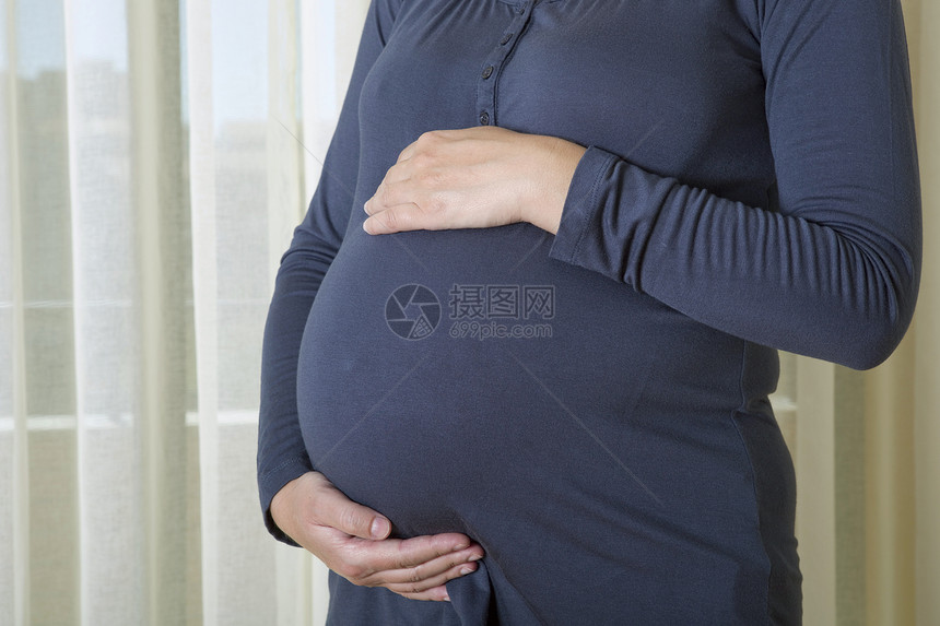 怀孕保健女士女性卫生白色妻子拥抱腹部生活身体图片