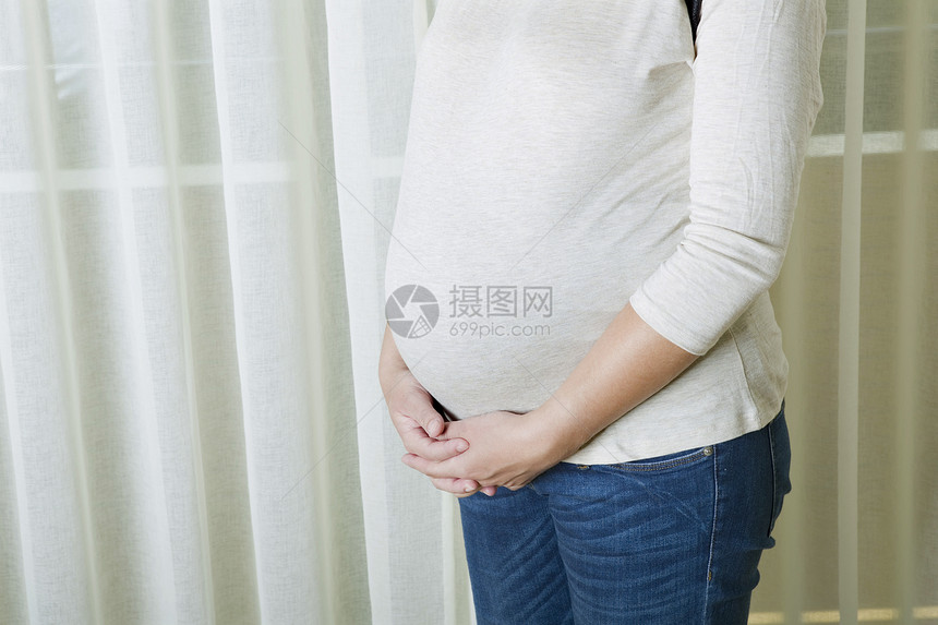 孕妇妻子拥抱家庭母亲喜悦白色卫生身体保健母性图片