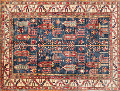 土地毯纺织品红色材料艺术挂毯羊毛古董装饰品丝绸编织背景图片