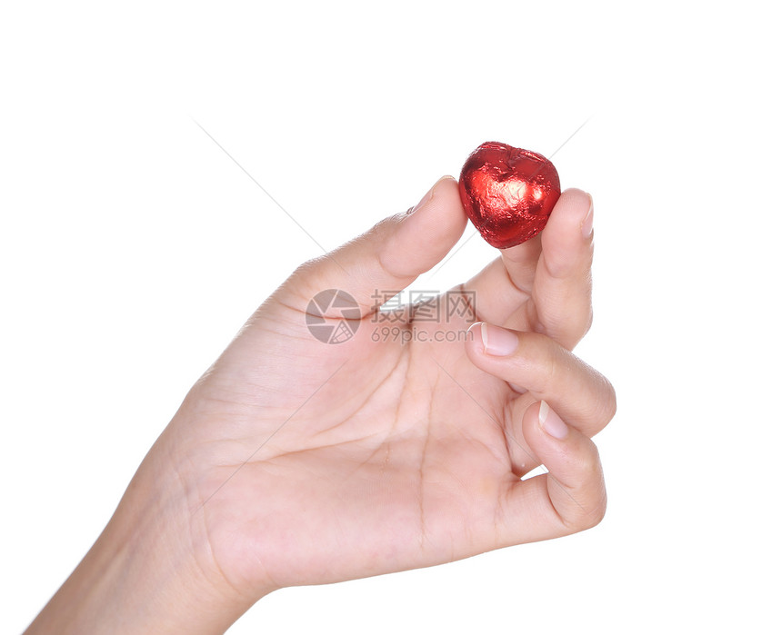 手头上的心脏巧克力礼物庆典女士女性甜点生日小雨食物营养热情图片