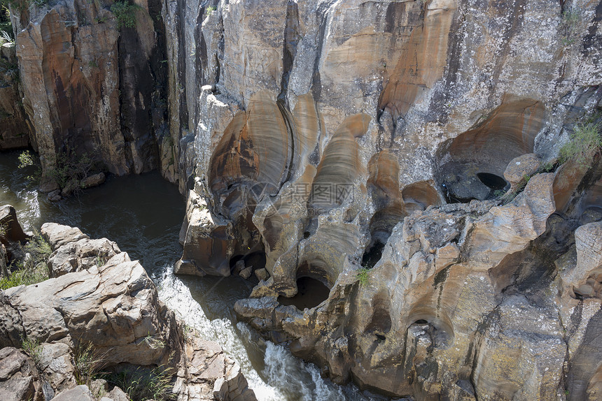 非洲南部的波尔克斯河水坑洞吸引力地质学漩涡溪流风化鹅卵石侵蚀峡谷基岩岩石图片