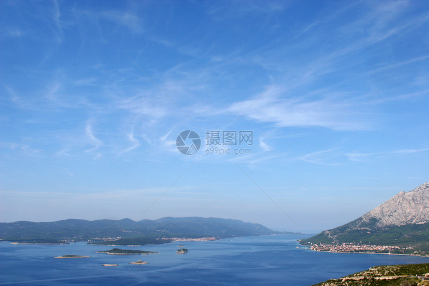 海海景观海浪旅行石头太阳蓝色阳光海岸海岸线环境天空图片