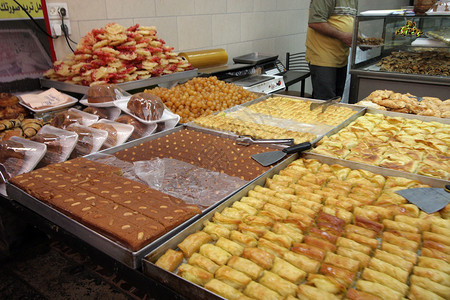 柜直冷以色列耶路撒冷市场美味的阿拉伯菜食糖背景