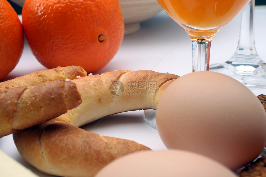 早餐教养橙子奶油状盘子调味品玻璃杂货果汁水果食物图片