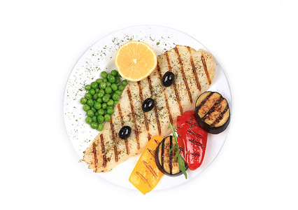 巴沙鱼烤蔬菜炙烤黄色胡椒产品熟食植物食物柠檬美食鱼片背景